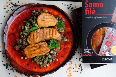 Catfish fillet with table of black and red lentils